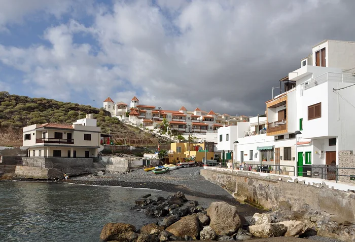 White waterfront houses and the small fishing bay at La Caleta, Tenerife